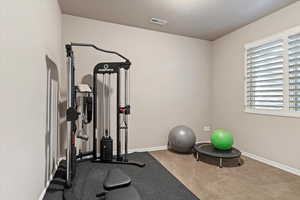 Basement space with 10' ceilings offering flexibility for a home gym, additional living area, or storage.