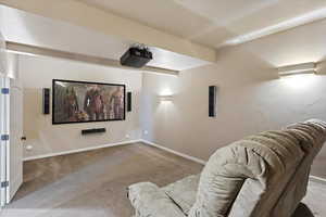 Custom theater room designed for entertaining, with surround sound.