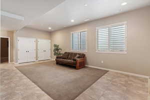 Fully finished basement with 10' ceilings, offering additional gathering space, abundant storage, and flexible use areas.