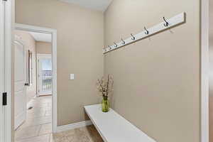 Functional mudroom space offering organization and easy access between living areas, designed to keep things clean and efficient.