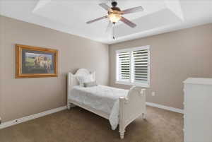 One of six bedrooms, offering flexible space for guests, office use, or additional living needs within a 6 bedroom, 4 bathroom layout.