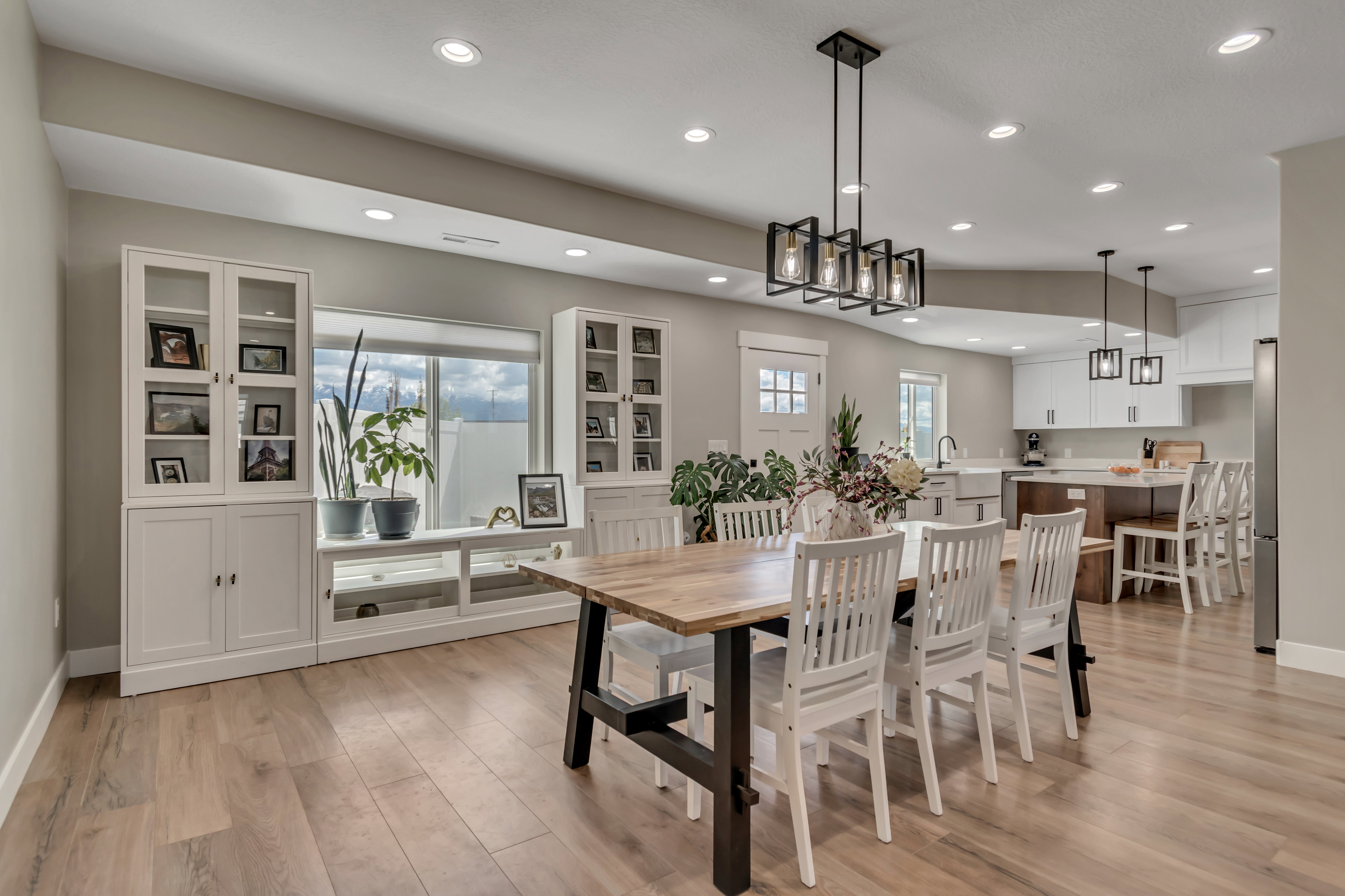 Dining space with light wood-style flooring and recessed lighting