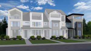 Modern home with a front lawn and a standing seam roof