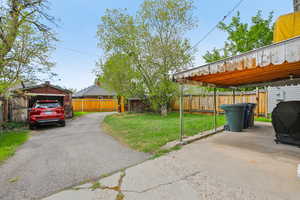 View of fenced backyard