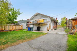 Back of house with a patio