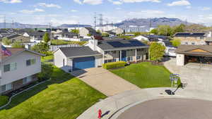 Aerial view of residential area with a mountainous background