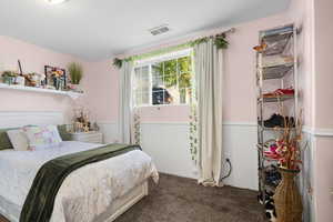 Bedroom featuring carpet