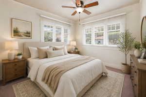 Virtual Staged Bedroom featuring carpet floors, crown molding, and a ceiling fan