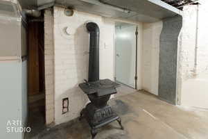 Unfinished below grade area with heating unit