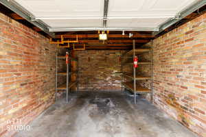 Garage featuring a garage door opener