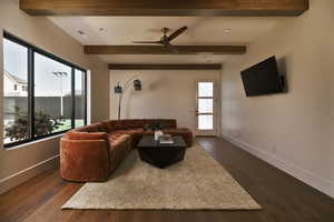 Casita Living room featuring recessed lighting, dark wood finished floors, a ceiling fan, and beamed ceiling