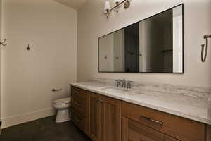 En Suite Bathroom with vanity and toilet