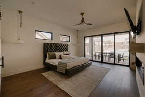 Primary Bedroom featuring dark wood-type flooring, ceiling fan, and access to outside