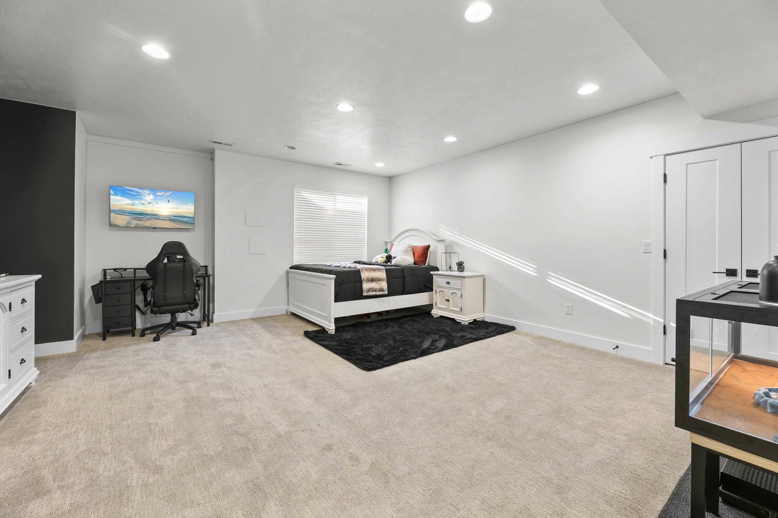 Recreation room featuring recessed lighting, an office area, and light colored carpet