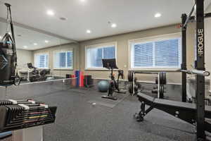 Gym with proper flooring and recessed lighting