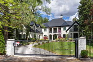Privacy and seclusion with iron fencing and two security gates.