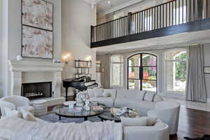 Living area featuring with overlook catwalk, reading nooks, and surrounded by stunning windows for so much natural light