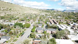 Aerial view of residential area with a mountainous background