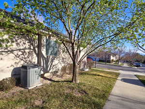 View of grassy yard featuring a residential view
