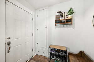 Doorway to outside with wood finished floors