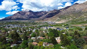 Mountain view featuring nearby suburban area