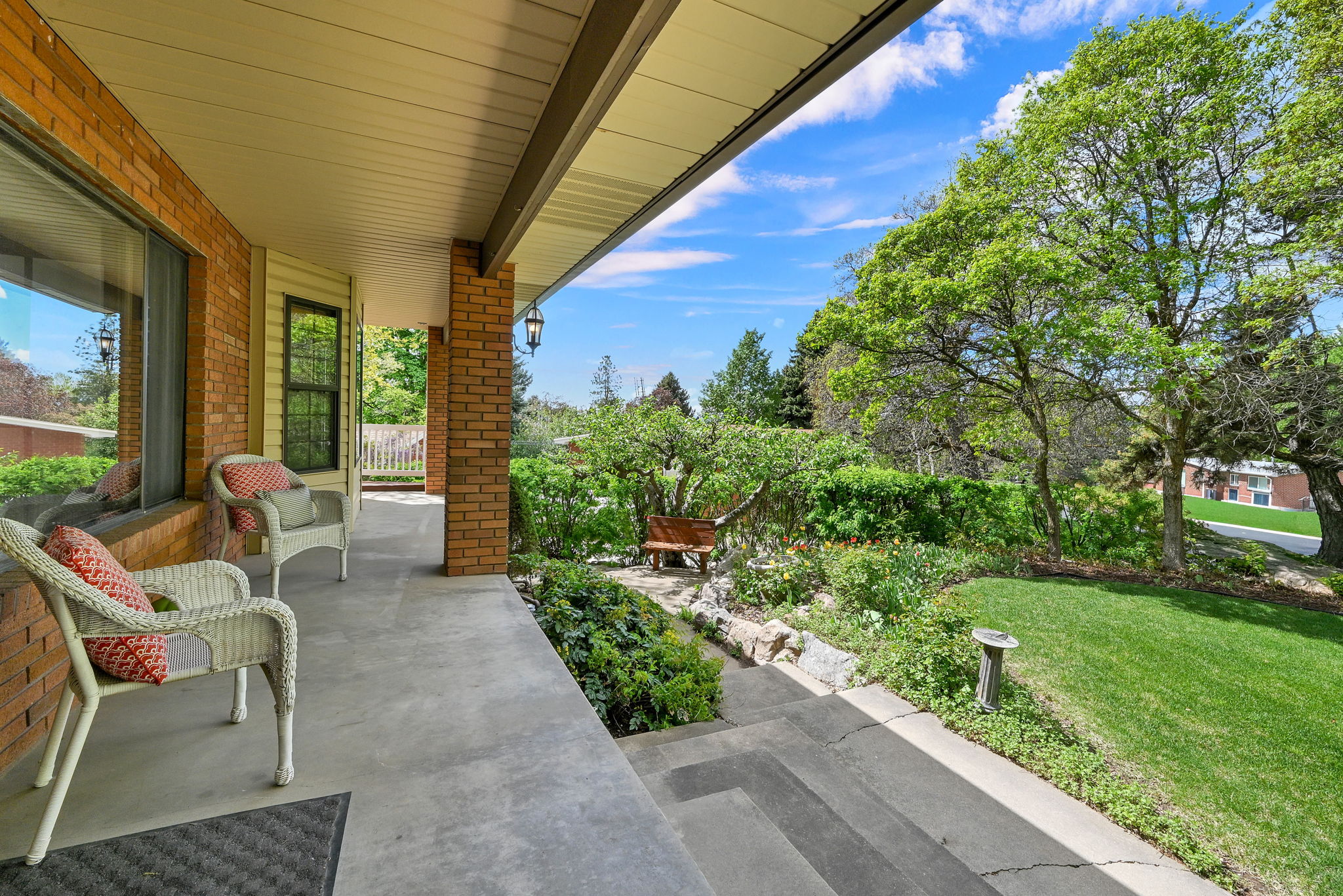 Covered porch with a yard