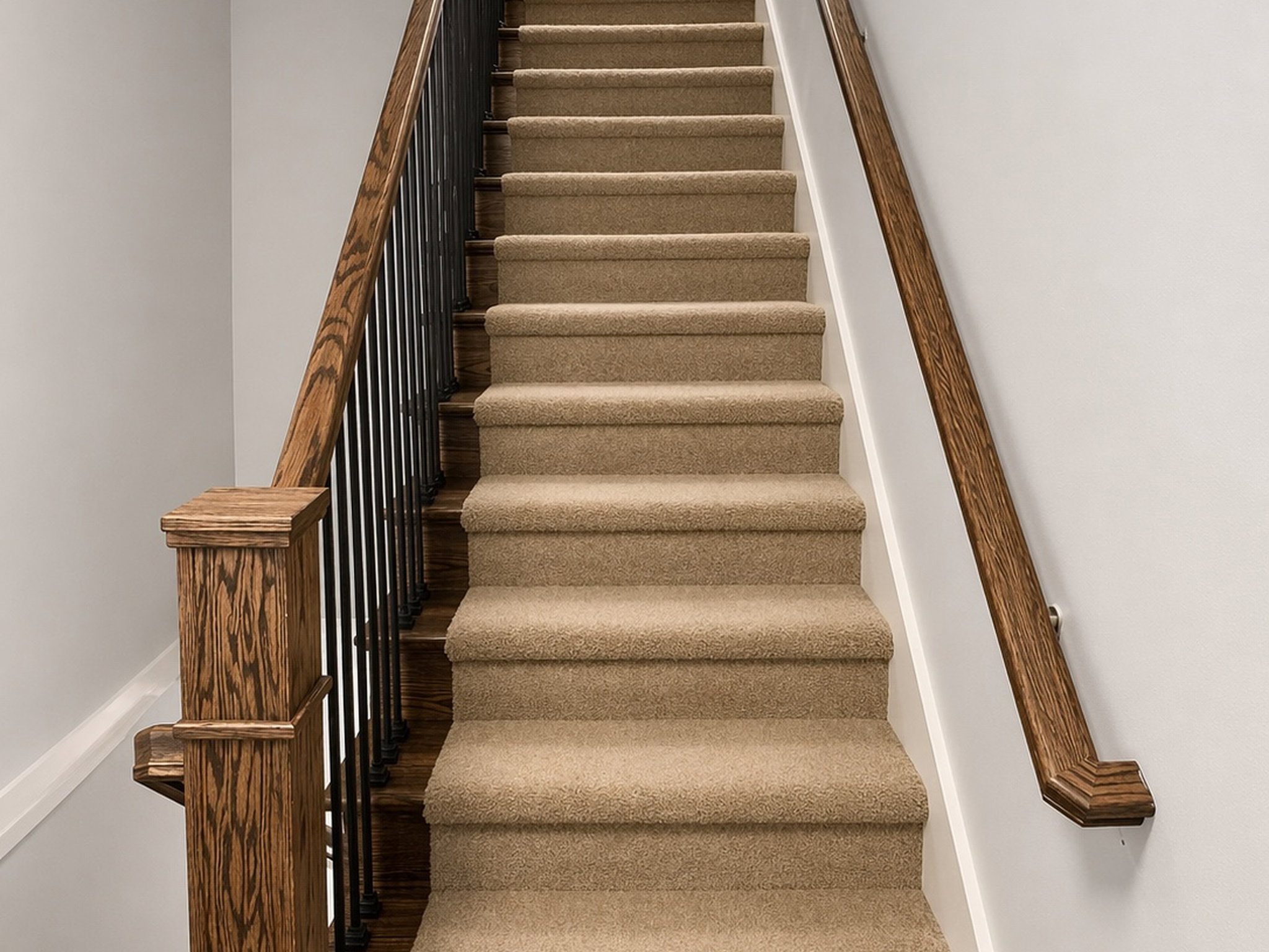 Stairway featuring baseboards