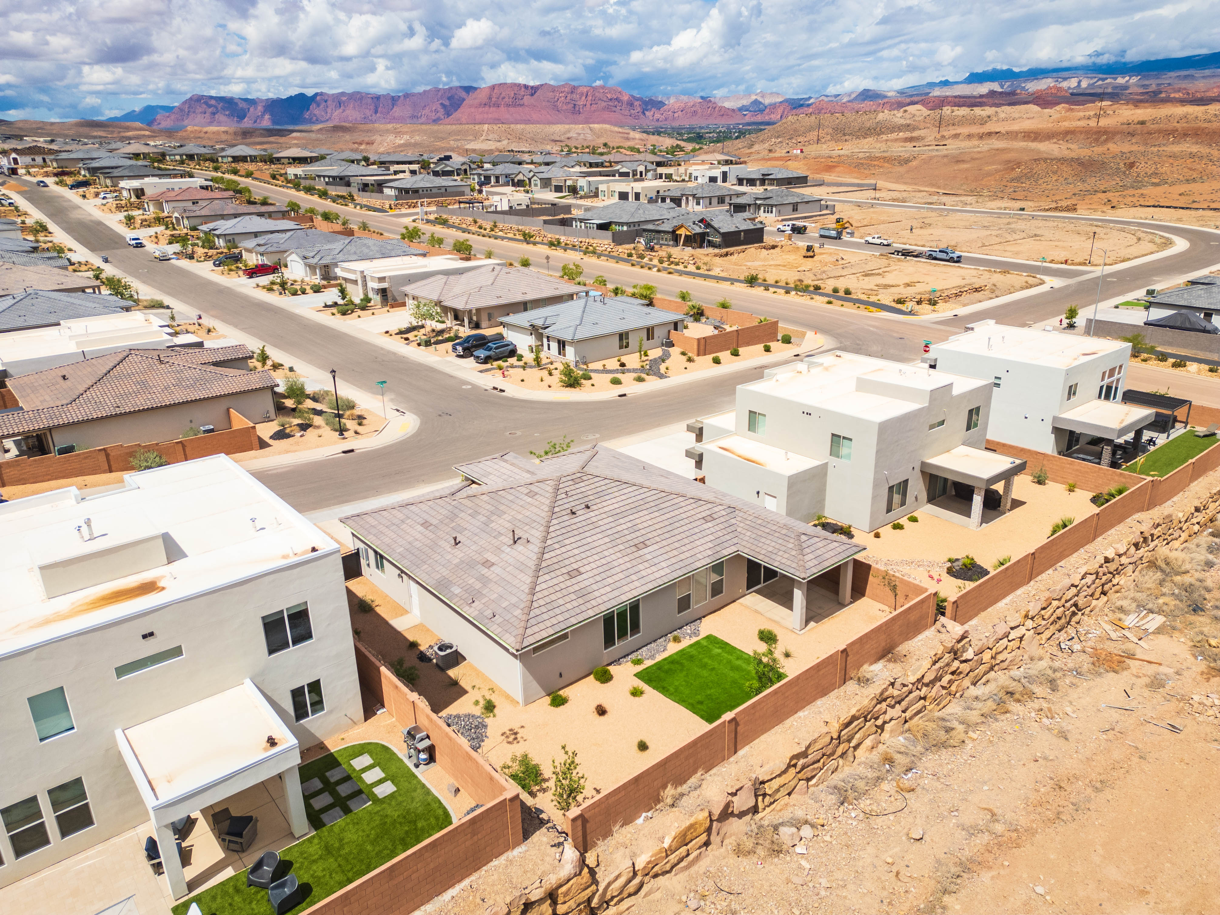 Aerial view of residential area with a mountain backdrop