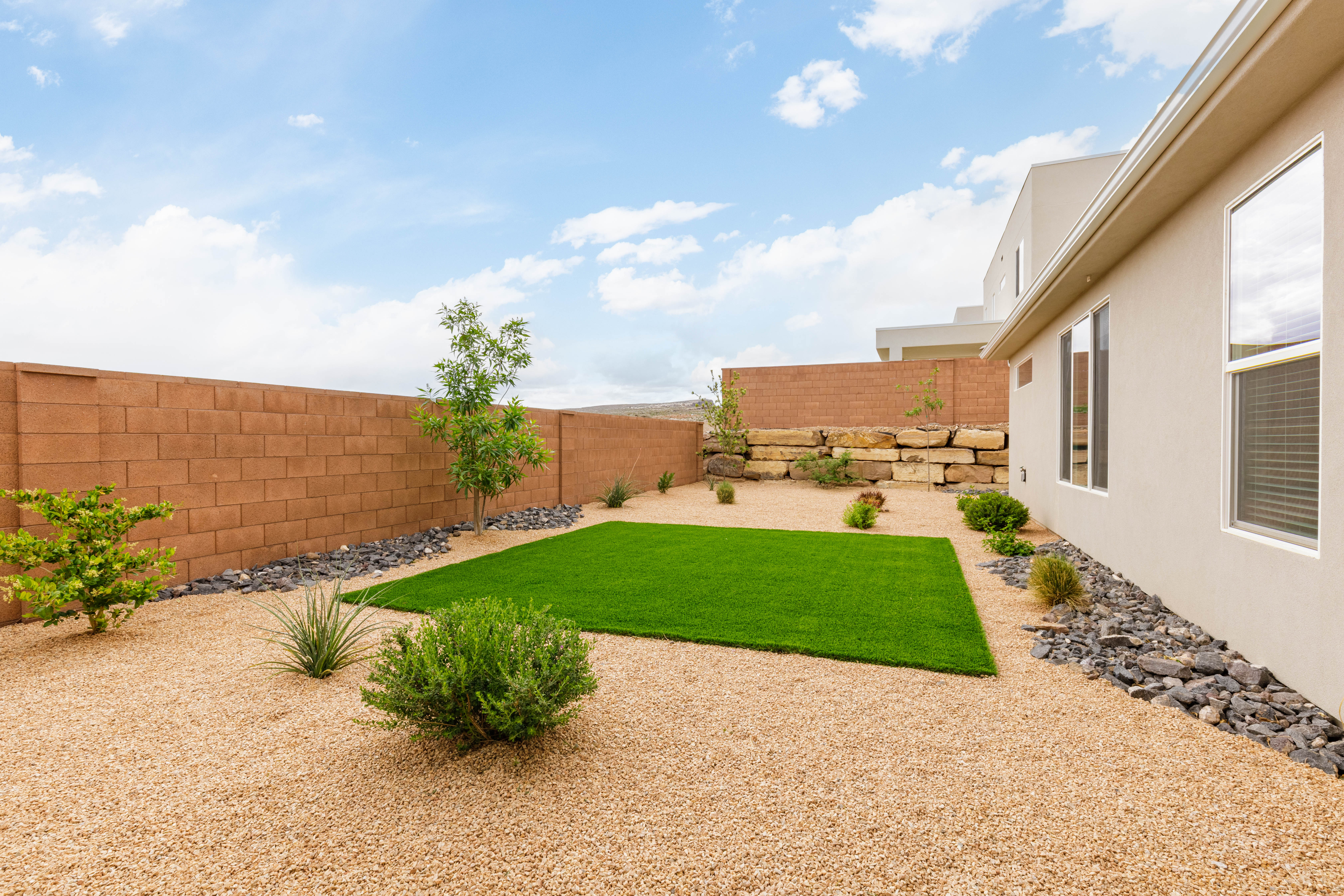 View of fenced backyard