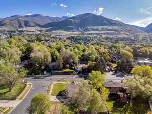 Aerial view of residential area featuring a mountain backdrop