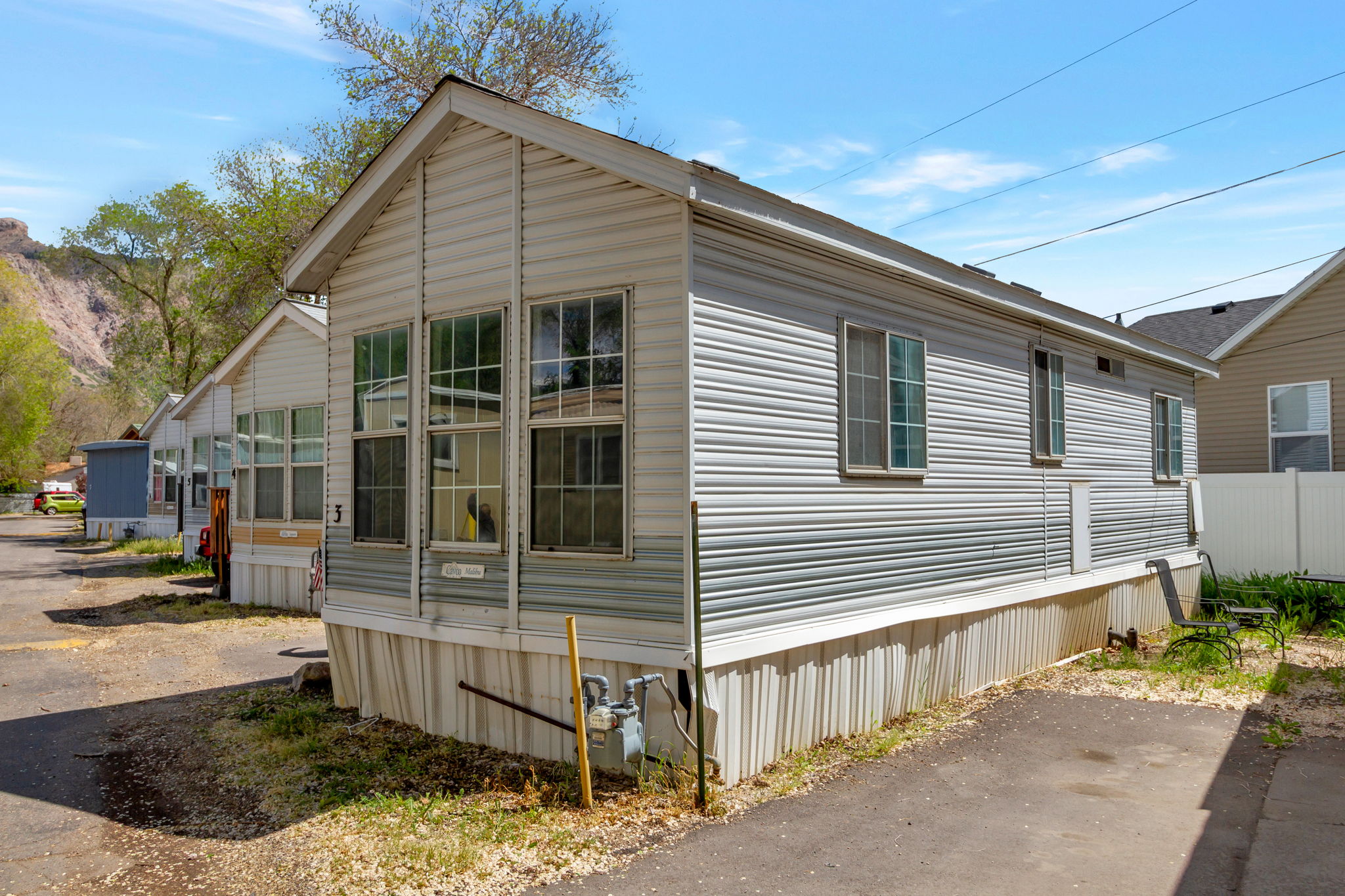 View of home's exterior featuring a sunroom