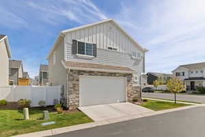 View of home's garage and driveway
