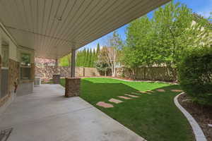 View of fenced backyard