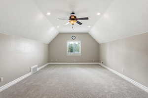 Additional living space featuring ceiling fan, light carpet, and recessed lighting