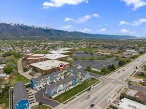Aerial view of residential area featuring mountains