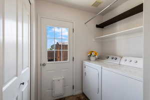 Laundry room featuring washer and dryer
