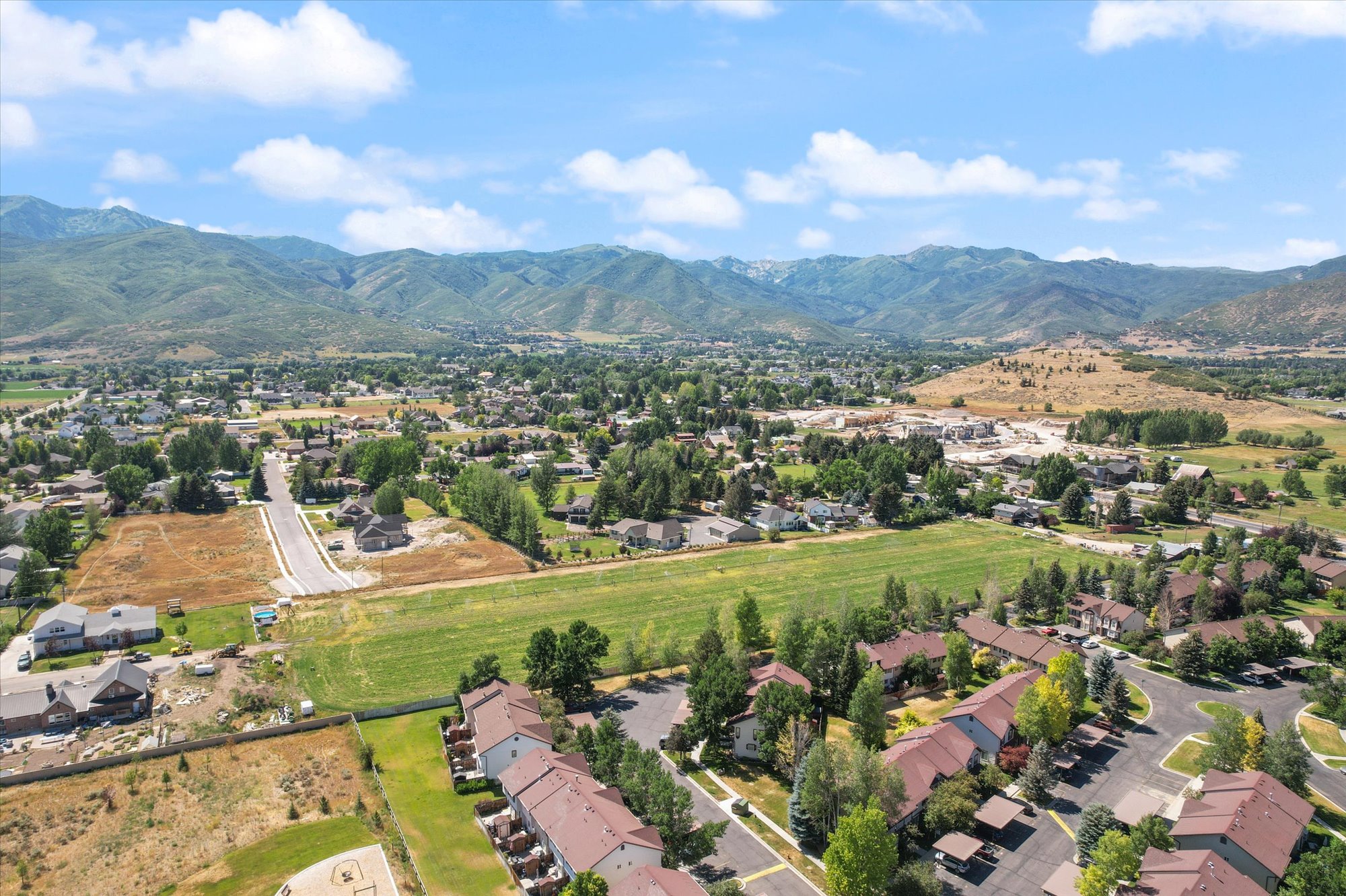 Aerial view of residential area with mountains