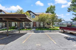 View of partially covered parking lot