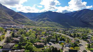 Mountain view featuring nearby suburban area