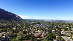 Aerial view of residential area with mountains