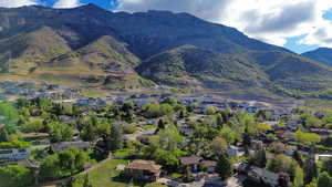 View of mountain backdrop with nearby suburban area
