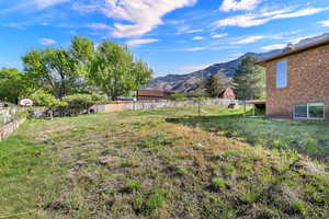 View of yard featuring a mountain view