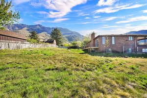 View of yard with a mountain view