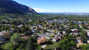 Aerial view of residential area with a mountainous background