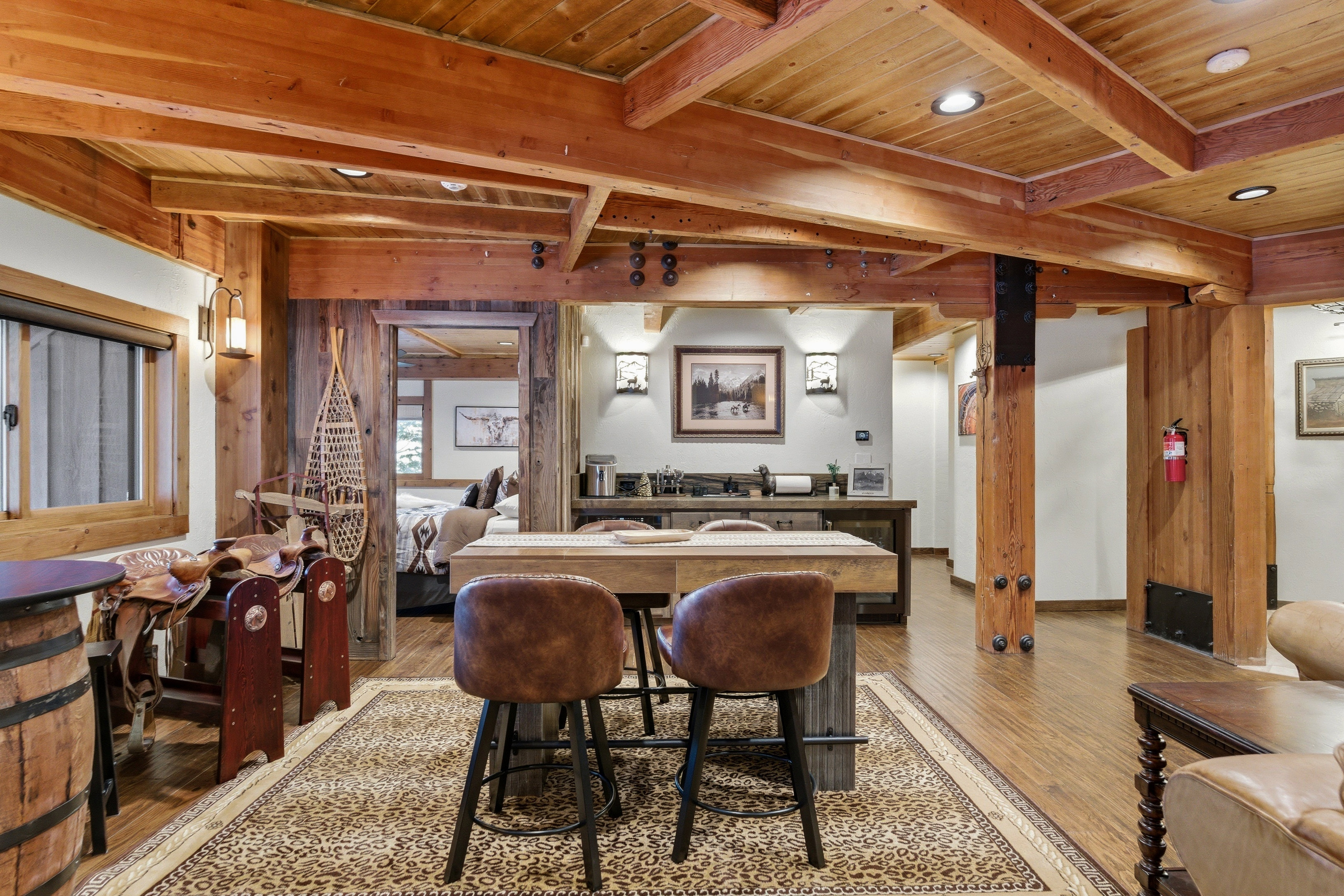 Dining area featuring a wood ceiling with exposed beams, wood-type flooring, and recessed lighting
