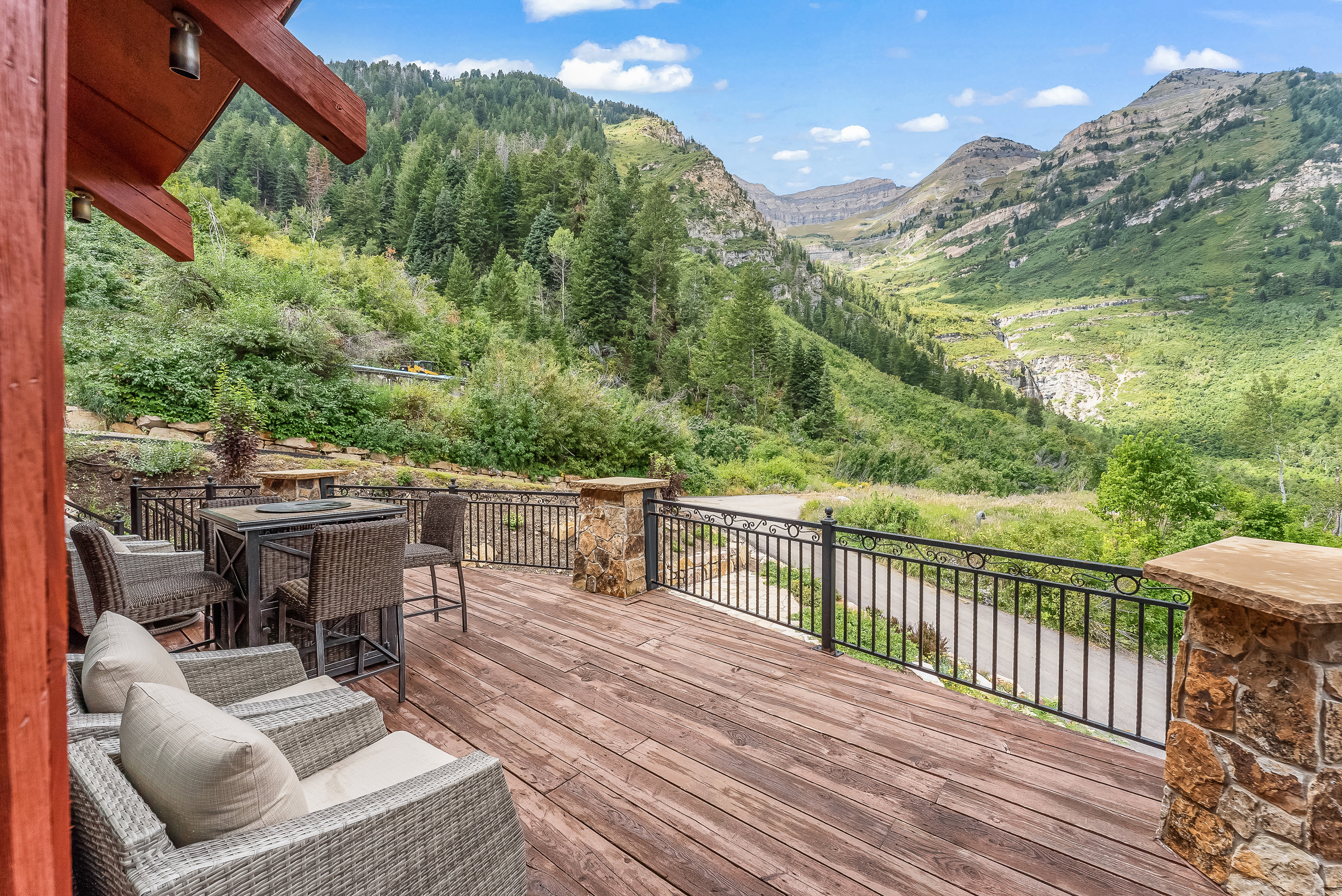 Deck featuring a mountain view and outdoor dining area