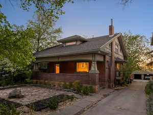 View of front facade a large sitting porch