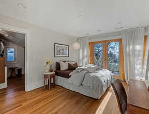 Bedroom featuring french doors to balcony