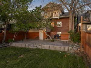 Rear view of house and patio
