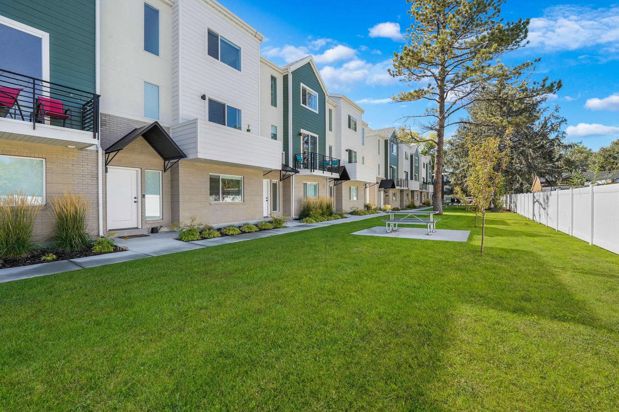 View of property's community featuring a residential view and a balcony